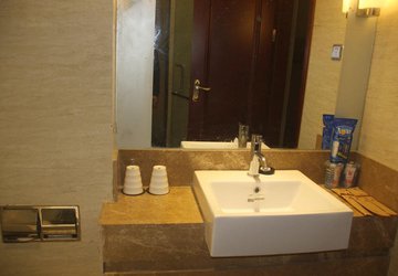 Фото Guangzhou Li Yang Hotel №