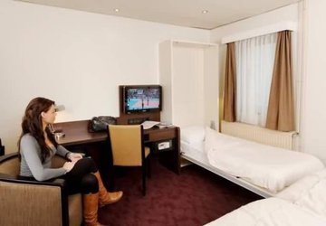 Фото Best Western Dam Square Inn №